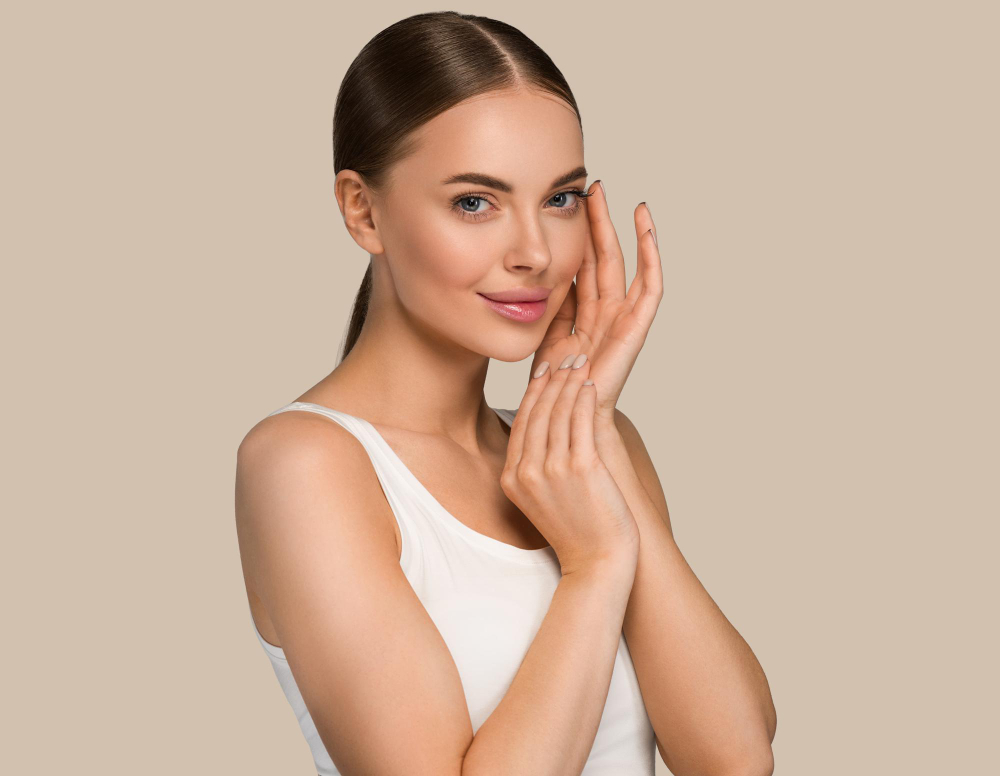 Beautiful woman with smooth skin after facial treatment at Vive Medical Spa